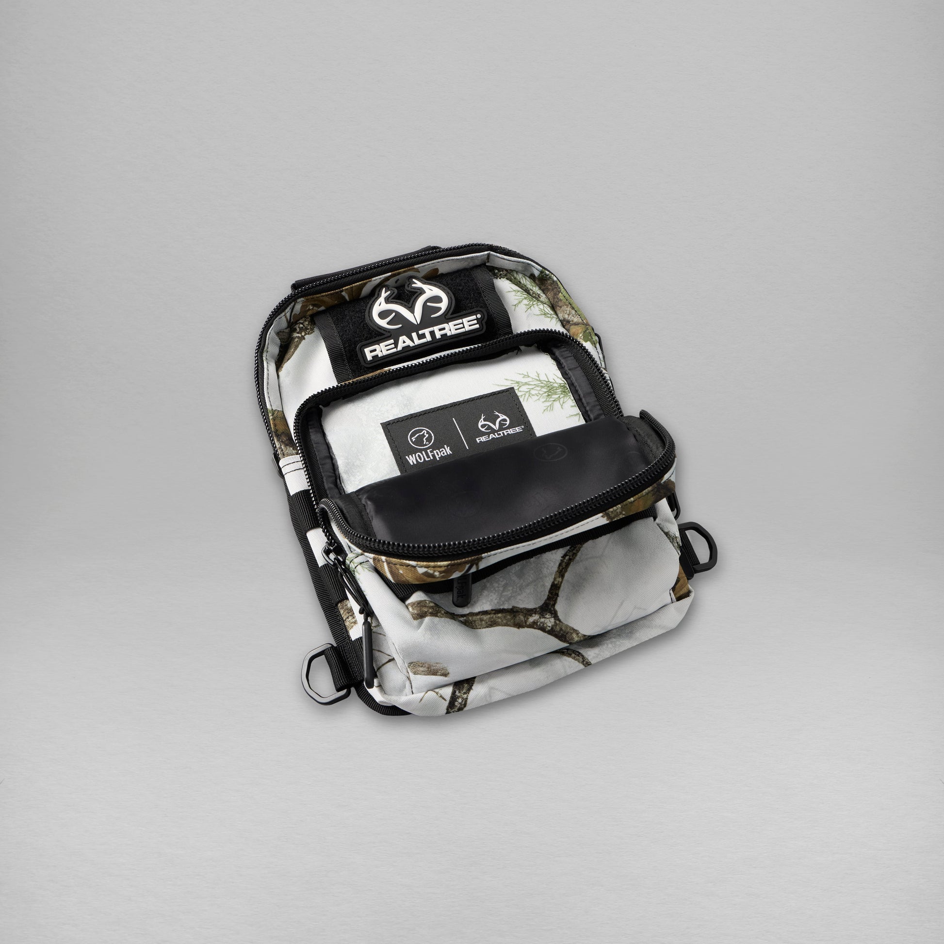 Realtree WOLFpak 9L Tactical Camo Sling Bag - Realtree APX Snow