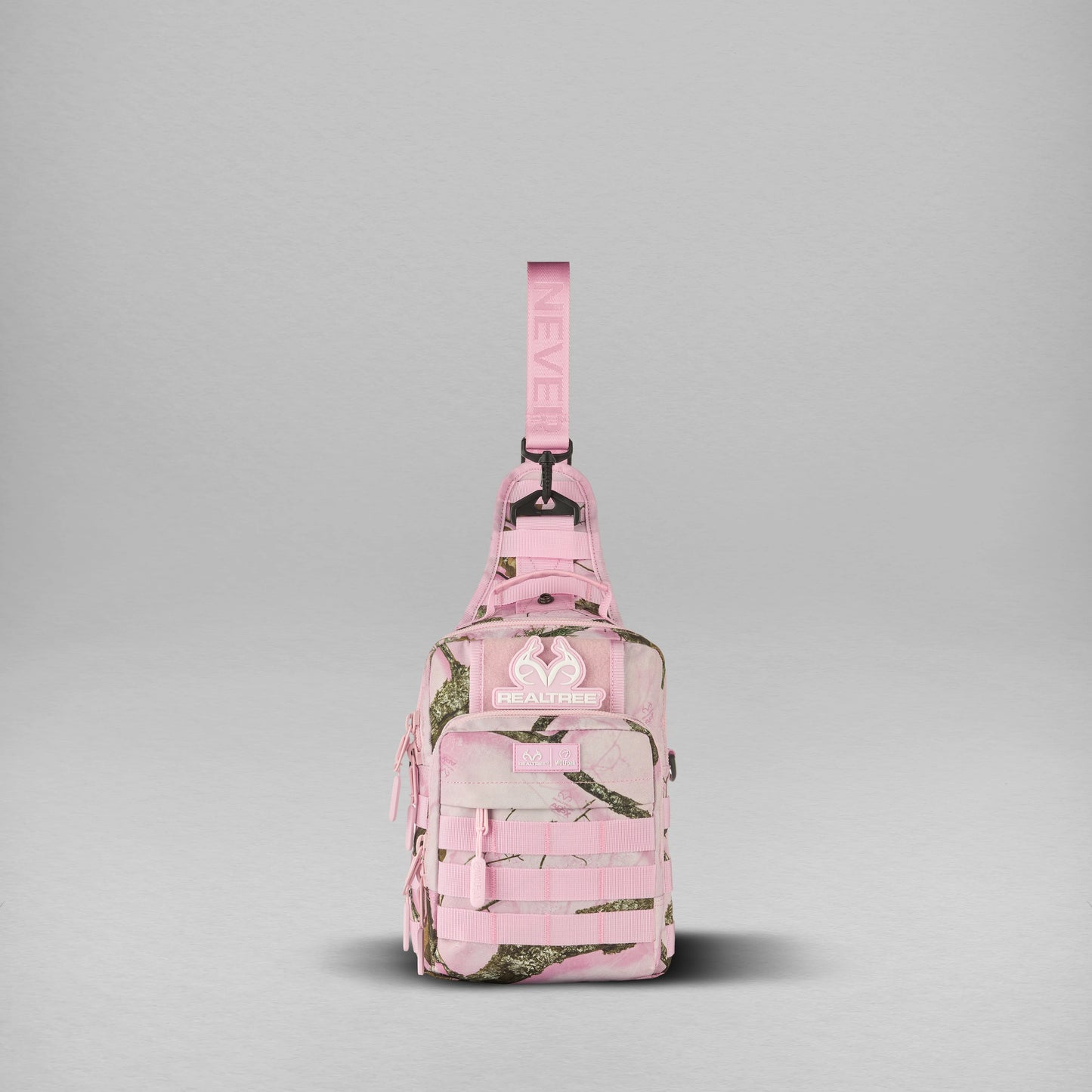Realtree WOLFpak 9L Flushing Pink Camo Tactical Sling Bag - Realtree APX Colors